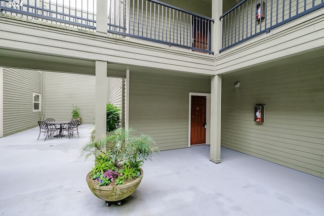 view of patio with a balcony