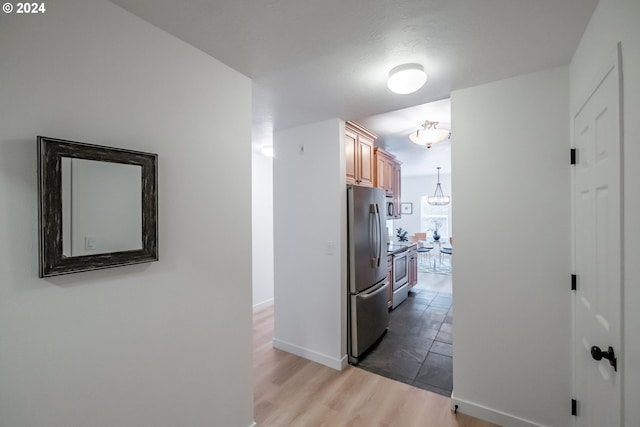 kitchen featuring dark hardwood / wood-style floors and stainless steel appliances