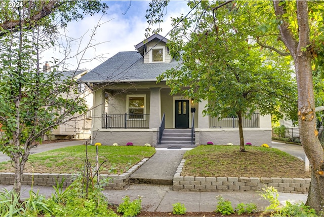 bungalow-style home featuring covered porch