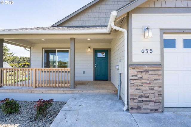 655 11th St SW, Bandon, OR 97411 - entrance to property featuring covered porch and a shingled roof