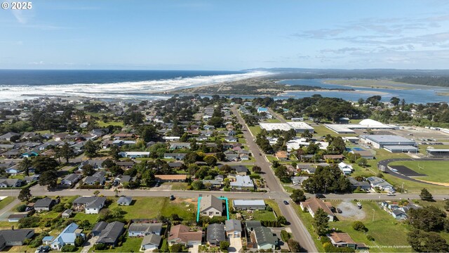 655 11th St SW, Bandon, OR 97411 - aerial view of property's location with a nearby body of water and nearby suburban area