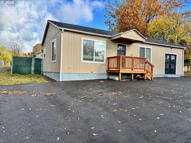 rear view of house with a deck