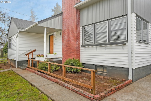 view of property exterior with a porch