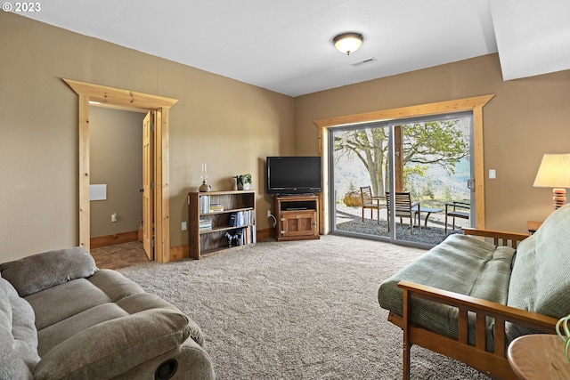 living room featuring light colored carpet