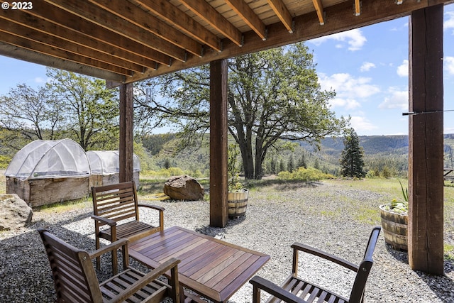 view of terrace featuring a mountain view