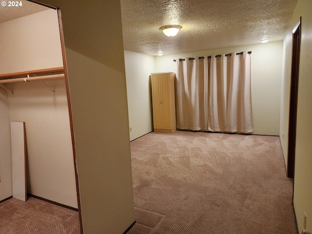 interior space with a textured ceiling