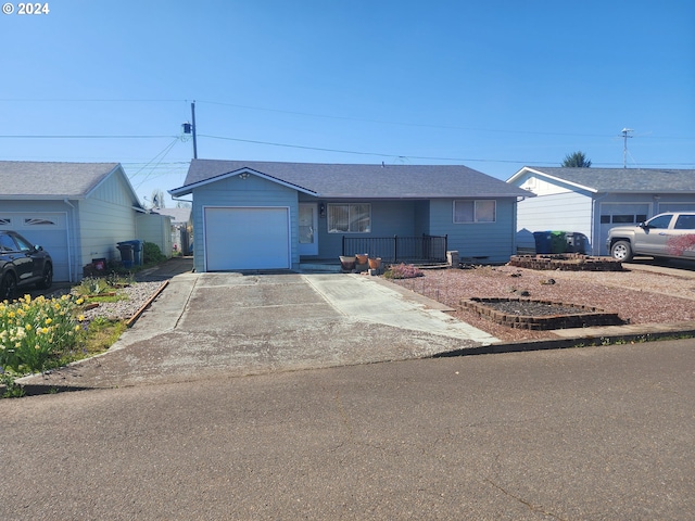 single story home with a garage