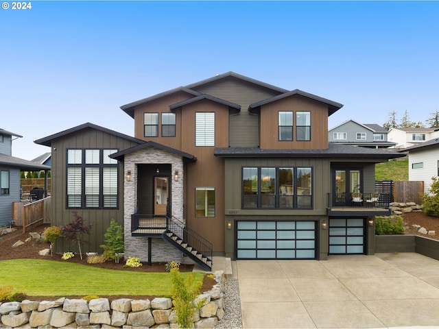 view of front of property with a garage