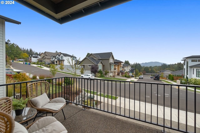 balcony featuring a mountain view