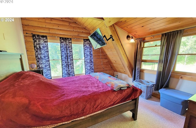 bedroom featuring wood ceiling, lofted ceiling, wood walls, and carpet floors