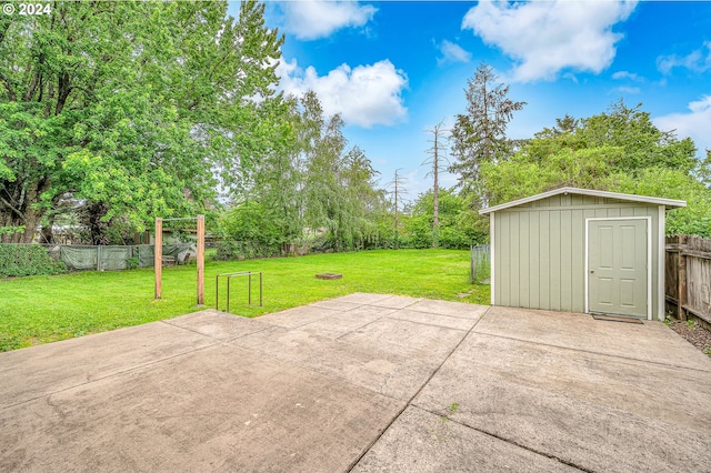 view of patio / terrace with a shed