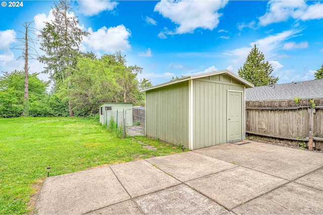 view of outdoor structure with a lawn