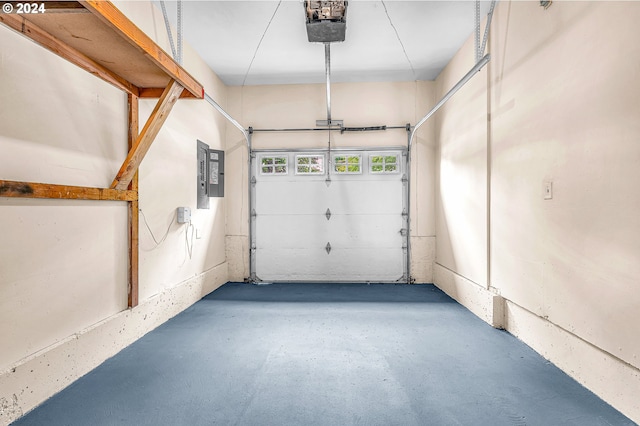 garage featuring a garage door opener and electric panel