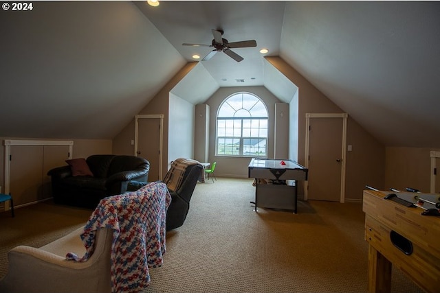 additional living space featuring ceiling fan, light carpet, and vaulted ceiling