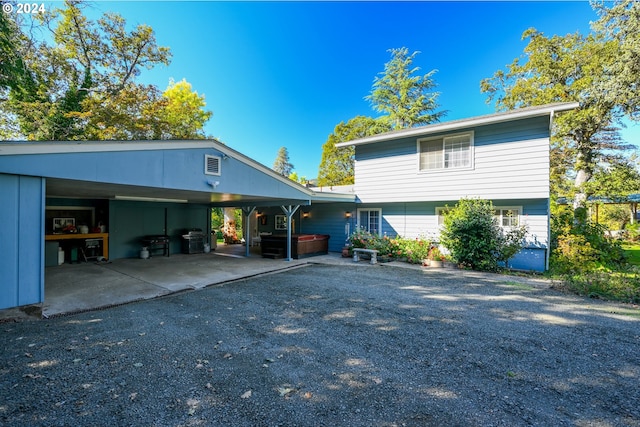 view of property exterior featuring a hot tub