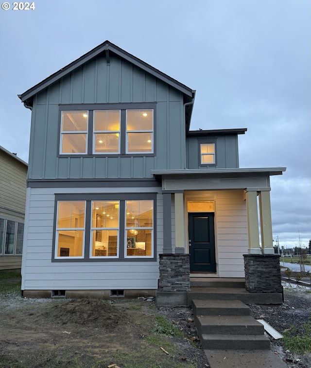 back of house with covered porch