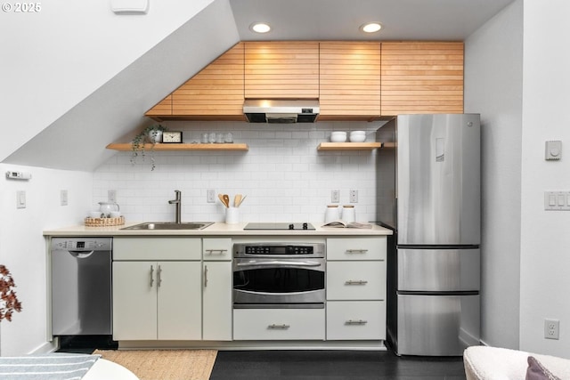 kitchen with stainless steel appliances, backsplash, and sink