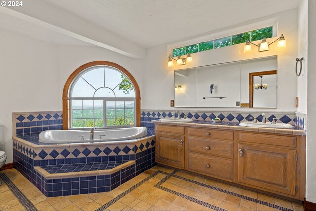 unfurnished bedroom featuring a notable chandelier, multiple windows, baseboards, and carpet floors