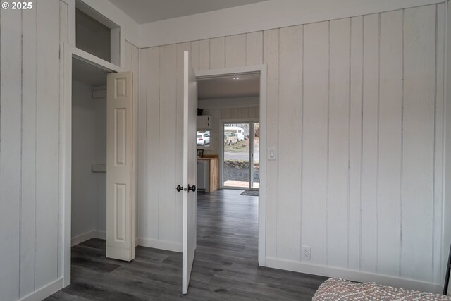 kitchen with white cabinets, white appliances, dark hardwood / wood-style floors, and sink