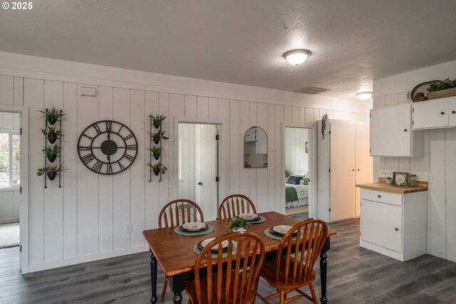 bathroom featuring hardwood / wood-style flooring, vanity, and toilet