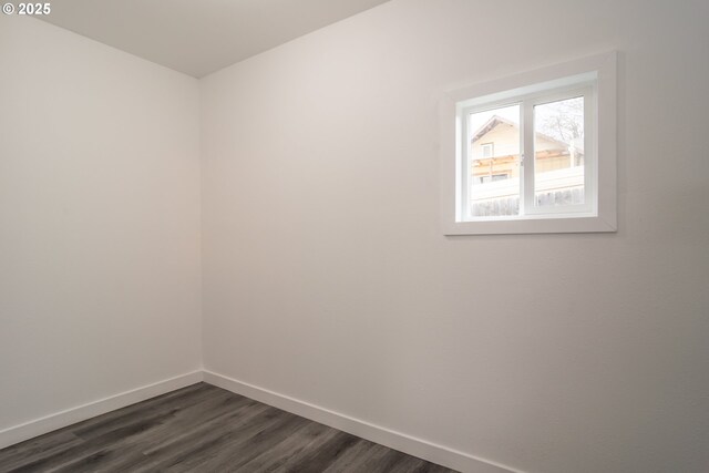 empty room featuring dark hardwood / wood-style floors