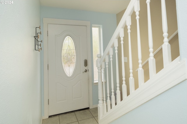 view of tiled foyer entrance