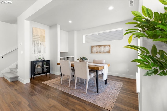 dining room featuring dark hardwood / wood-style flooring