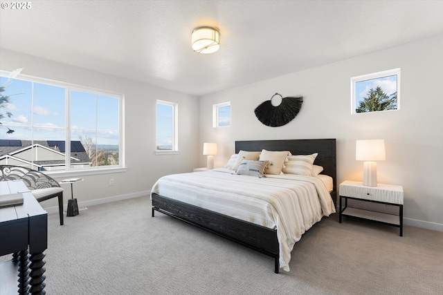 bedroom with light carpet