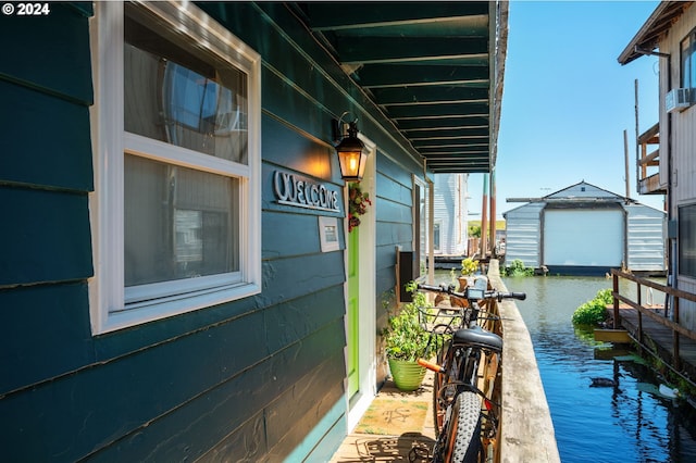 view of home's exterior with a water view