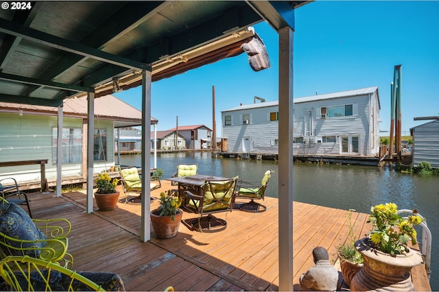 dock area featuring a water view