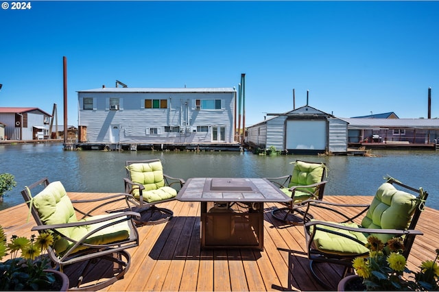 dock area with a water view