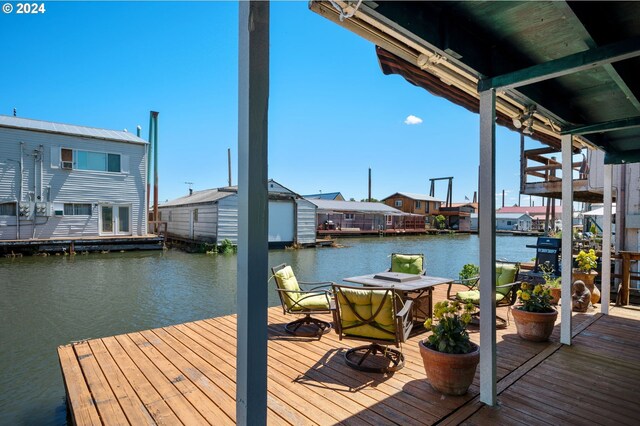 view of dock with a water view