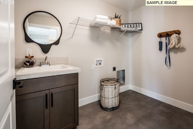 laundry area with cabinets, washer hookup, electric dryer hookup, and sink