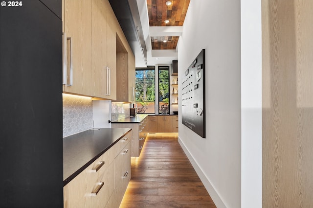 corridor with wood ceiling and dark hardwood / wood-style flooring