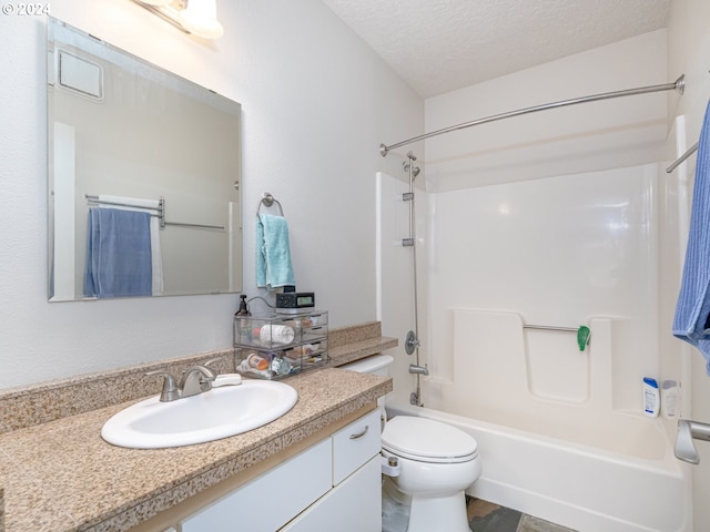 full bathroom with vanity, toilet, shower / bath combination, and a textured ceiling