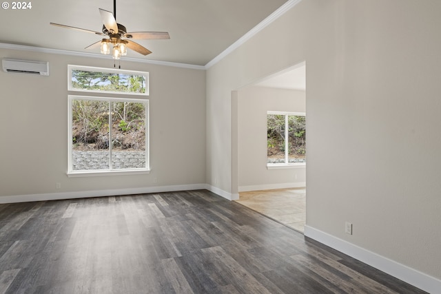 empty room with crown molding, ceiling fan, hardwood / wood-style floors, and an AC wall unit