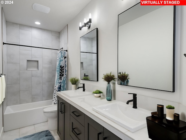 full bathroom with vanity, toilet, shower / bath combination with curtain, and tile patterned flooring