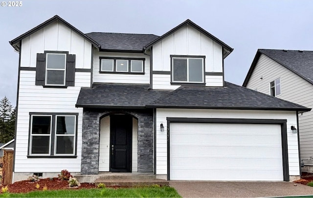 17374 SW Kalapuya Ln Unit 70, Sherwood, OR 97140 - view of front of house with board and batten siding, driveway, a shingled roof, and a garage