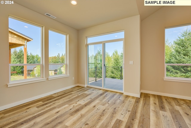 17374 SW Kalapuya Ln Unit 70, Sherwood, OR 97140 - doorway featuring plenty of natural light, wood finished floors, baseboards, and recessed lighting