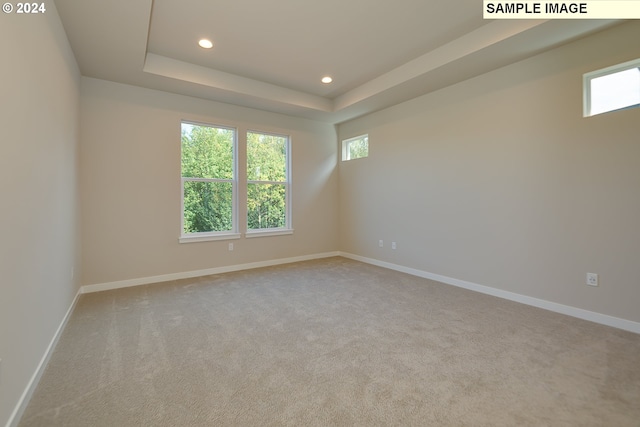 17374 SW Kalapuya Ln Unit 70, Sherwood, OR 97140 - carpeted spare room featuring plenty of natural light, recessed lighting, baseboards, and a tray ceiling