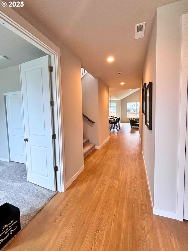 17374 SW Kalapuya Ln Unit 70, Sherwood, OR 97140 - hallway featuring light wood finished floors, baseboards, stairs, and recessed lighting