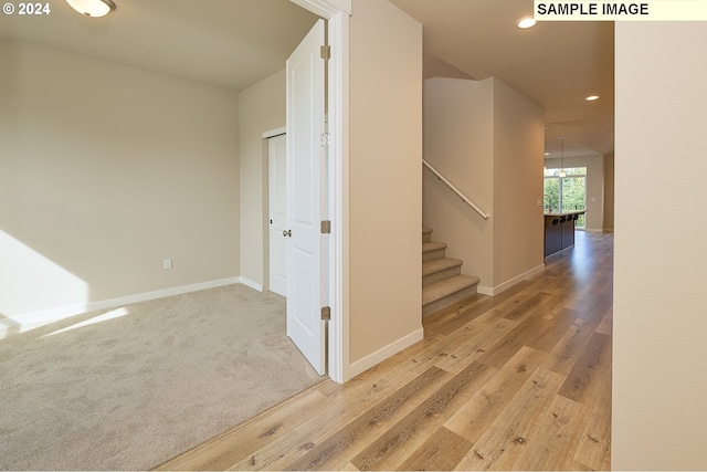 17374 SW Kalapuya Ln Unit 70, Sherwood, OR 97140 - corridor featuring light wood finished floors, baseboards, recessed lighting, and stairway