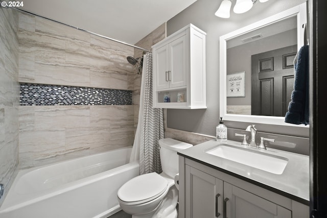 full bathroom with shower / bathtub combination with curtain, vanity, and toilet