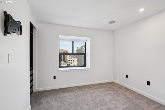 1025 NW Couch St Unit 716, Portland, OR 97209 - empty room with carpet floors and recessed lighting