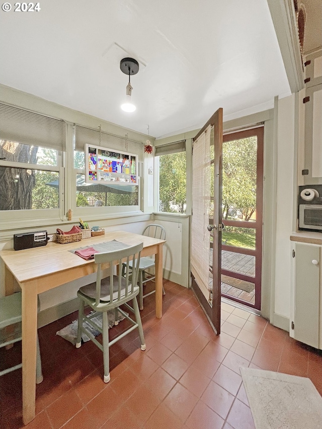 interior space with french doors and a healthy amount of sunlight