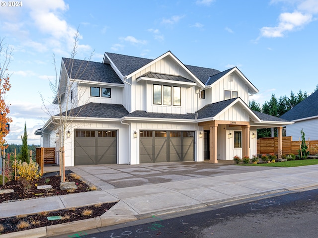 modern inspired farmhouse featuring a garage