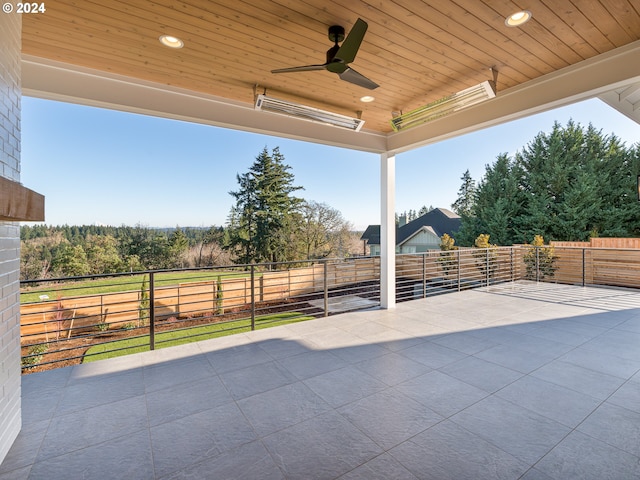 view of patio featuring ceiling fan