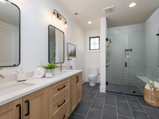 bathroom with walk in shower, tile patterned flooring, vanity, and toilet