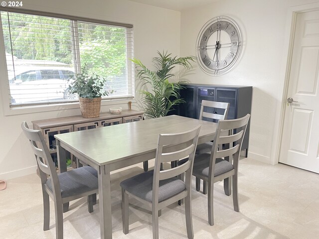 dining space featuring plenty of natural light