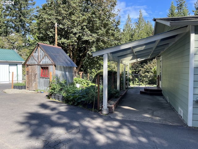 view of car parking featuring a carport